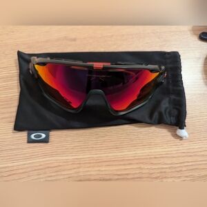 Oakley Jawbreaker sunglasses with clear lens and reflective lens
